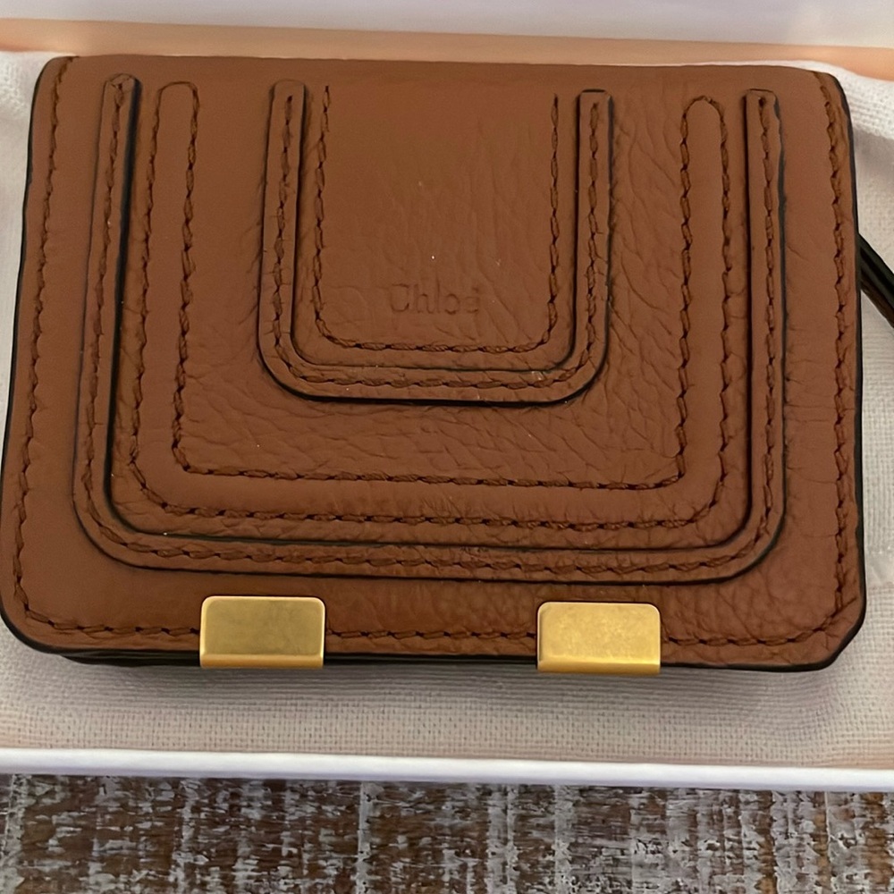 NWT - used ONCE. Comes with bag and dust bag.